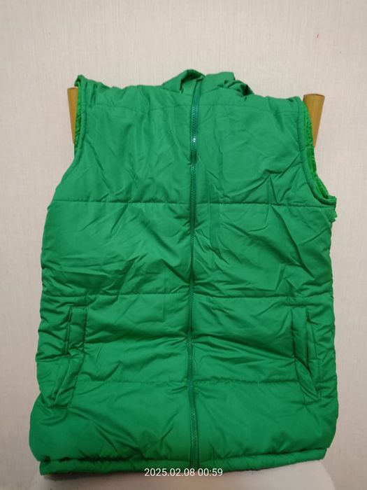 Безрукавка новая