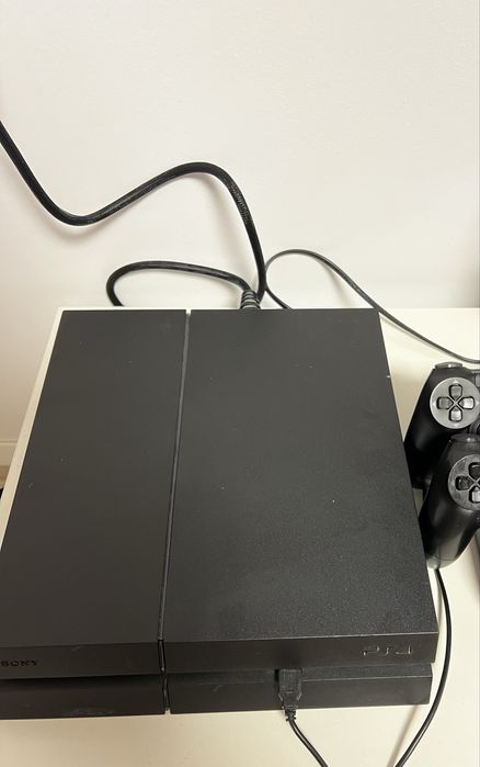 PS4 1TB + 6 jocuri, stare excelentă