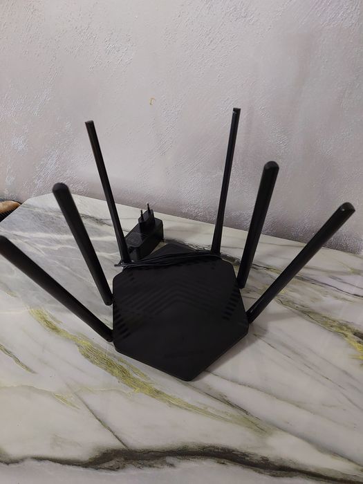 Mercusys икки диапазонный узоқдан хам зур ишлиди холати янгидай