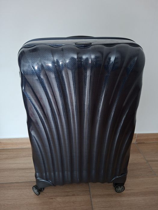 Vând troler Samsonite, nou.