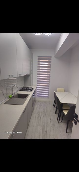 Tunari/Inchiriez Apartament cu grădină 2 camere 60mp  mobilat și utila