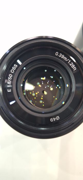 Sony E 50mm f/1.8 OSS 
Из