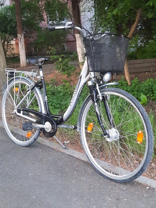 Vând bicicleta de dama marca PEUGEOT mărime roti  de 28.