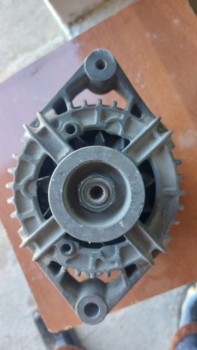 Генератор на Опель астра G