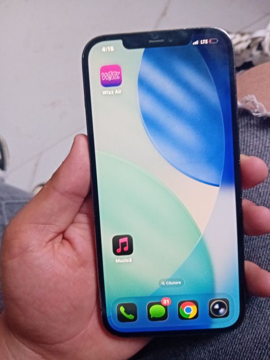 Vand telfon iphone 12 pro max o 100 capacitate la baterie 256gb