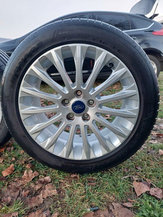 Jante focus 3 pe 17 Complete cu anvelope 215 50 17 model Titanium X