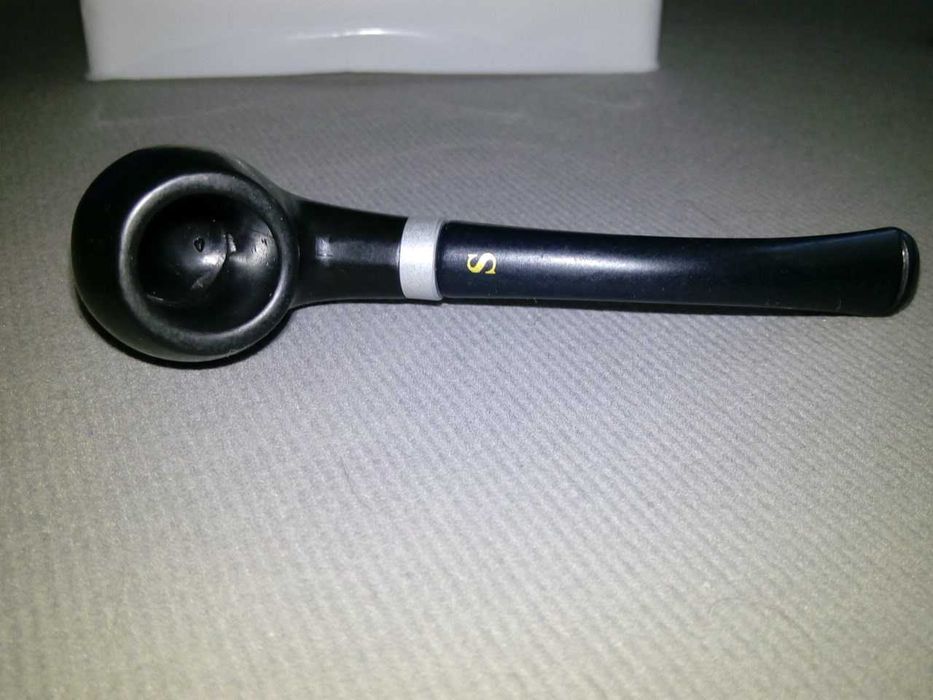 курительные трубки в запечатанных коробках.