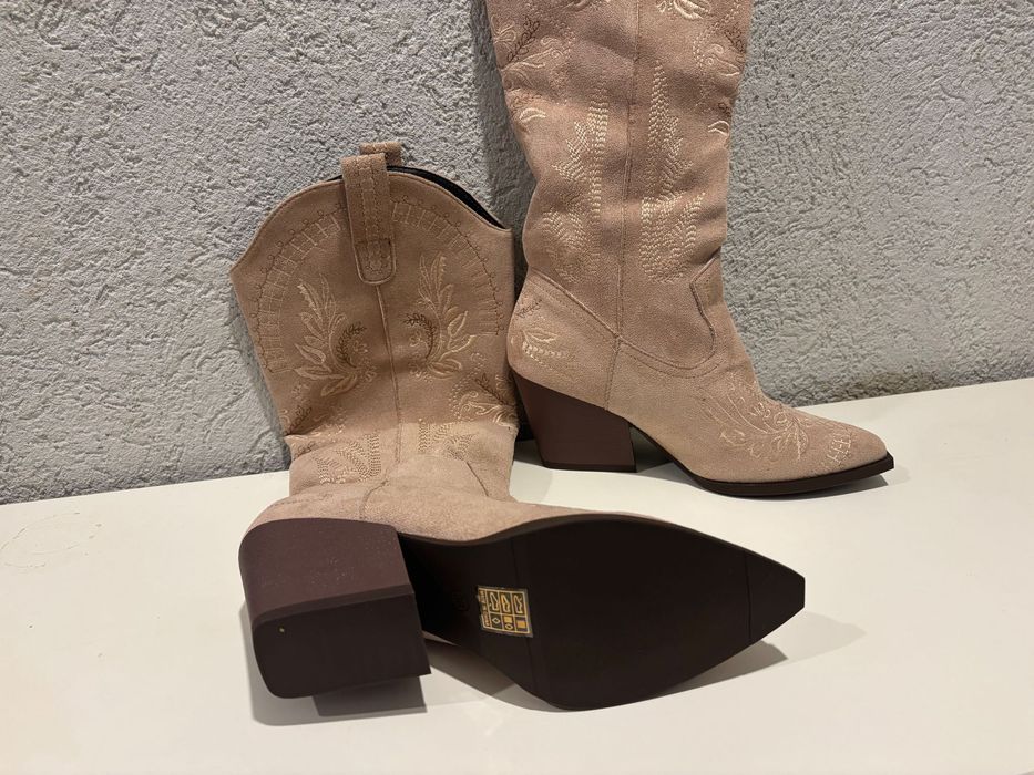 Чисто нови ботуши