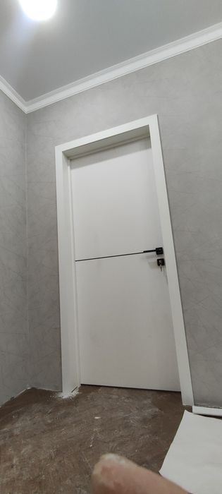 Плотник по дверям