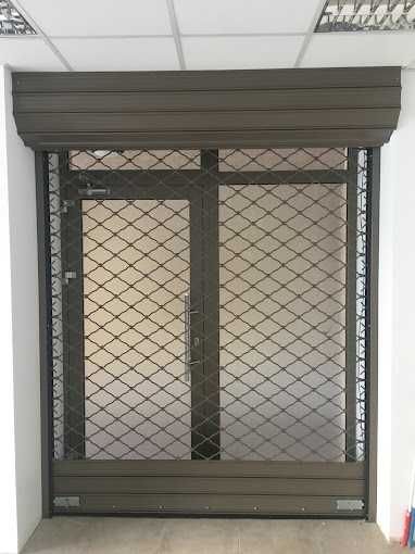 Врати гаражни, ролетни и охранителни, сенници доставка и монтаж