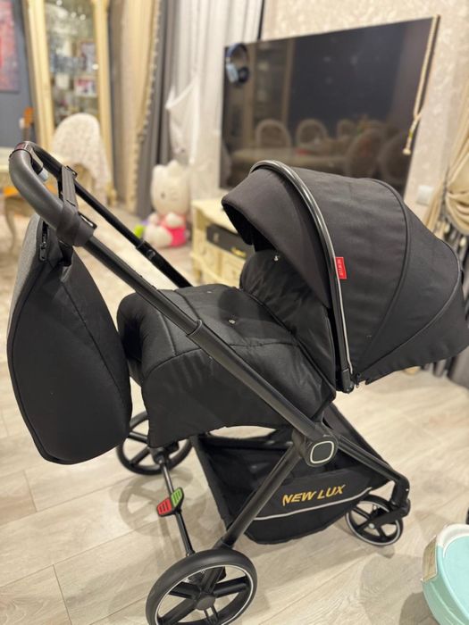 Комфортная коляска  NEW LUX