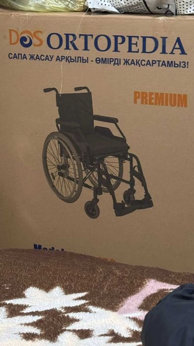 механическая инвалидная коляска