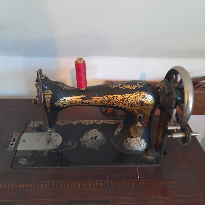 Masina de cusut Singer