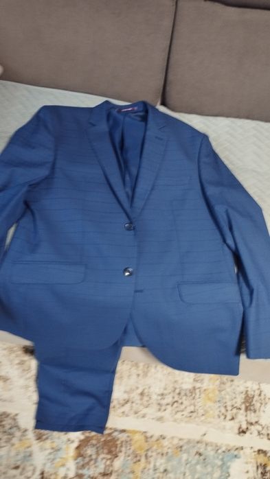 Продам костюм с брюками.