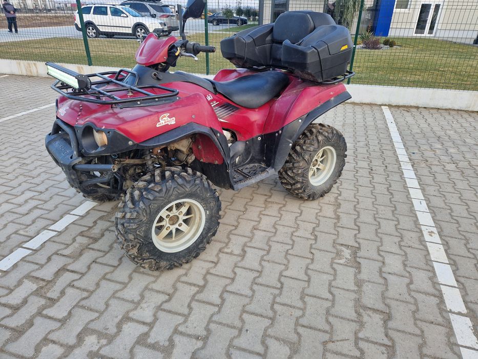 Vând sau schimb ATV Kawasaki
