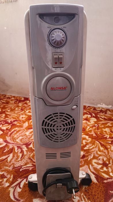 Масляный обогреватель в хорошем состоянии