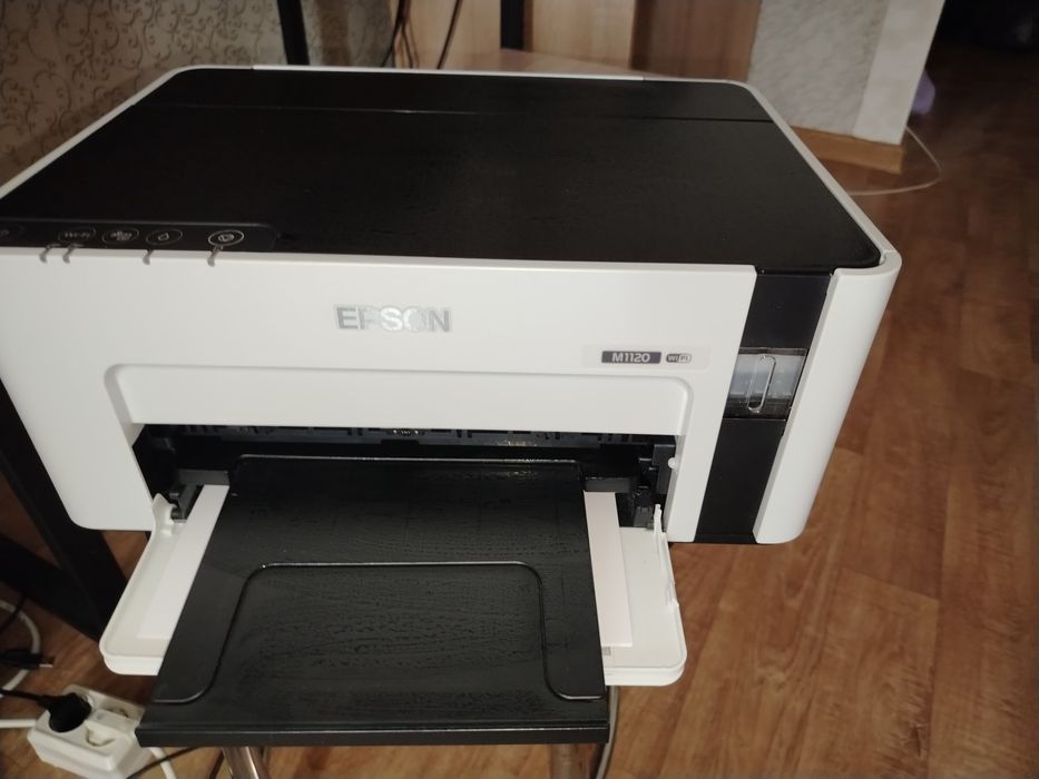 Продам чёрно белый принтер епсон M1120 новый