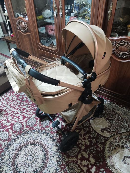 Янги коляска сотилади.