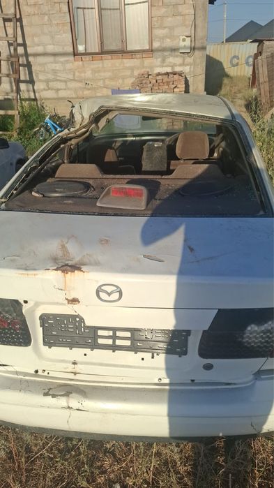 Мазда 626 птичка