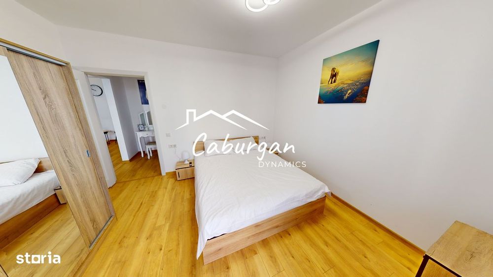 Apartament cu 2 camere, 50mp utili+balcon, bucatarie inchisa,parcare.