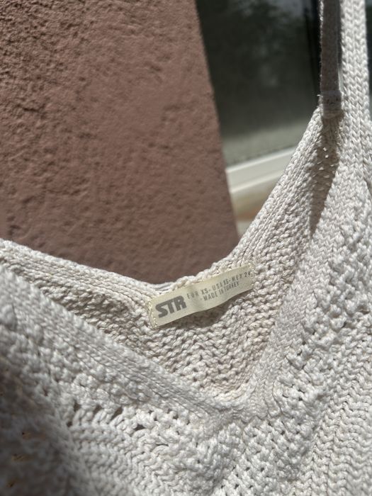 Top tricotat pentru plaja