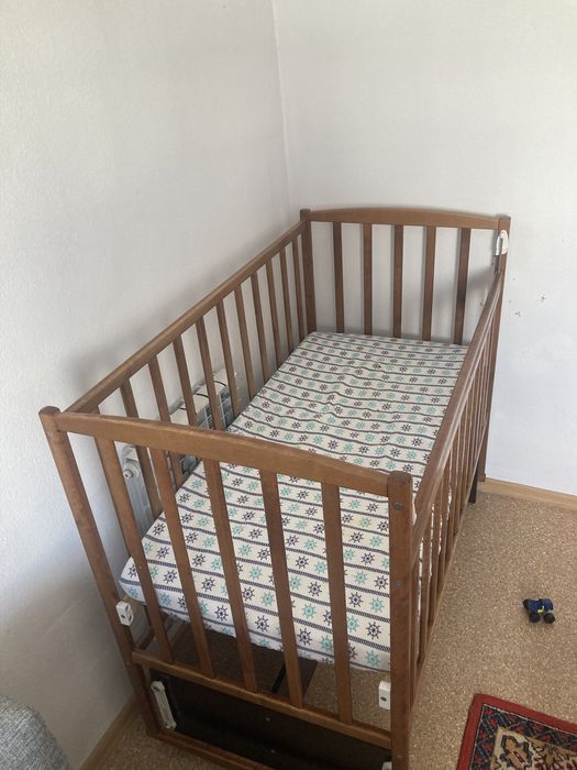 Детская кроватка маятник