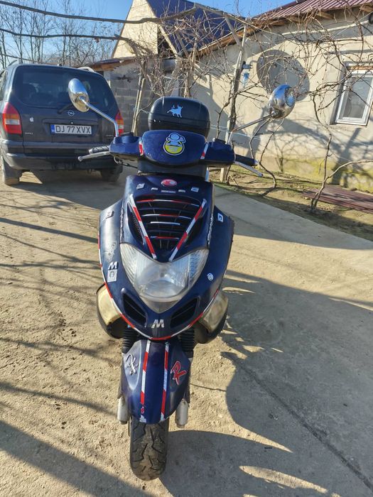 :-Kymco.   40 de milioane - Negociabil