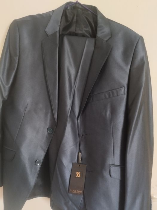 Продам костюм новый .