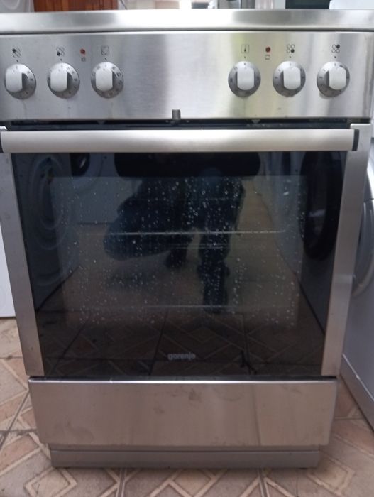 Иноксова свободно стояща печка с керамичен плот Gorenje с 2 години Гаранция