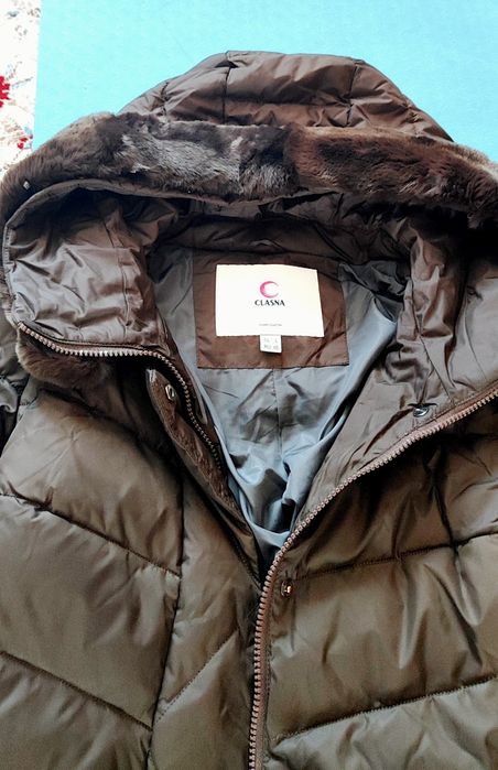 Продам фирменный пуховик