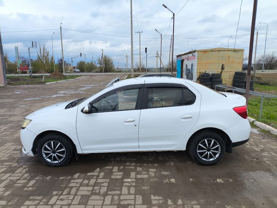 Рено логан Renault logan 2015