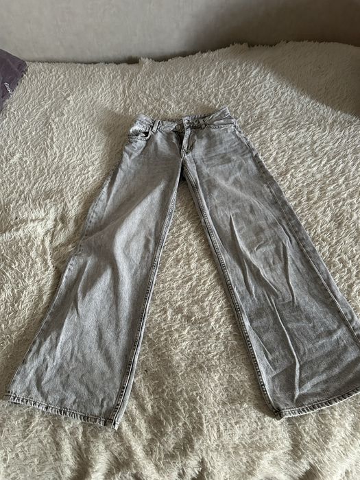 Джинсы,серого цвета