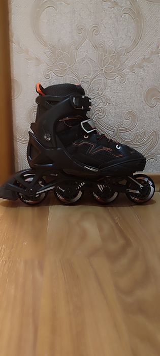Роликовые коньки