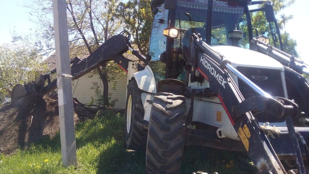 Услуги экскаватора погрузчика