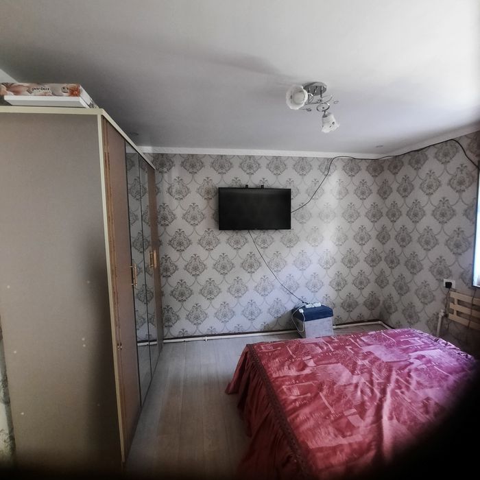 Продаётся дом в городе Чирчик, в бонус авто KIA ориентир Юмалак Хавас