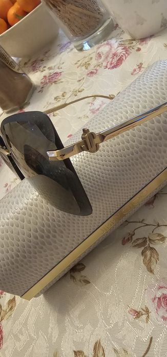 Продавам използвани слънчеви очила Jimmy Choo с чанта и калъф