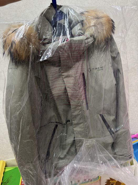Продам зимний пуховик