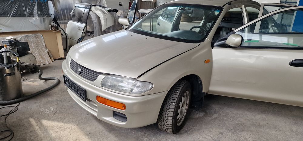 Продам лобовое стекло мазда 323 ВА 1995г.