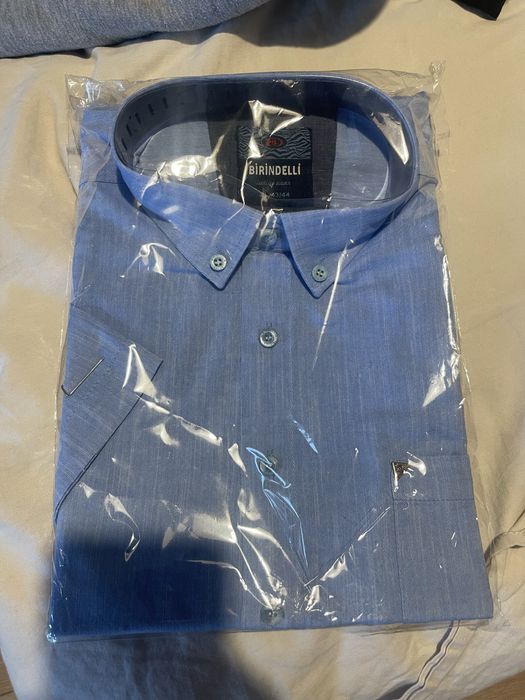 Жилетка нова и риза чисто нова