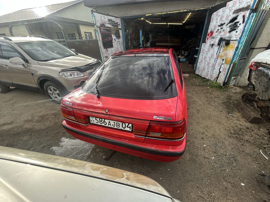 Машина Mazda 626