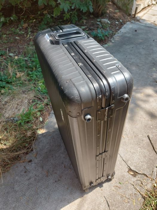 Rimowa valiza troller geamantan