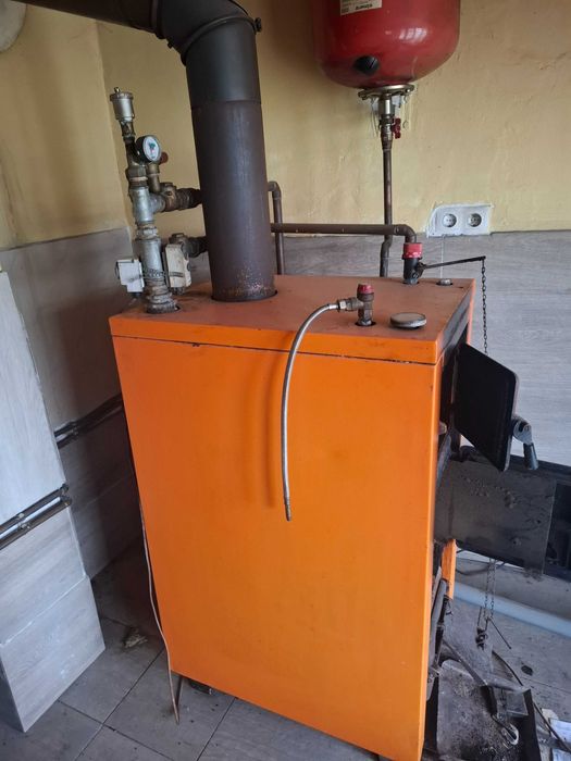 Centrală pe lemn in stare perfectă de funcționare!