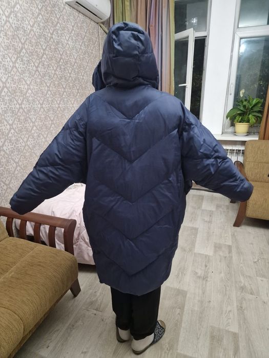 Продам пуховик тёмно-синего цвета