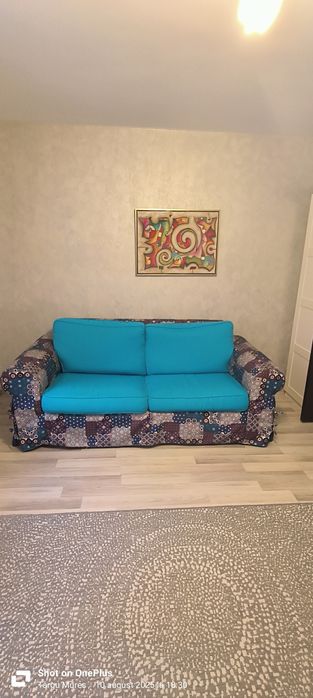 Canapea extensibila și fotoliu