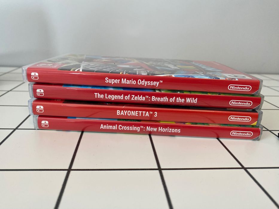 Nintendo Switch + 4 игри + Zelda кейс + microSD 256GB