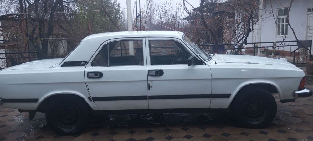 Газ-3102 холати урта балондан яхши 100 лик газ балон  документ  жойида