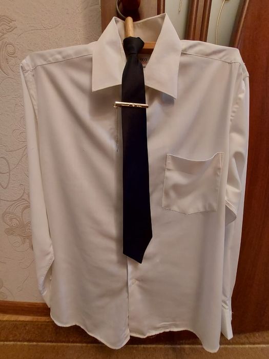 Костюм-тройка новый