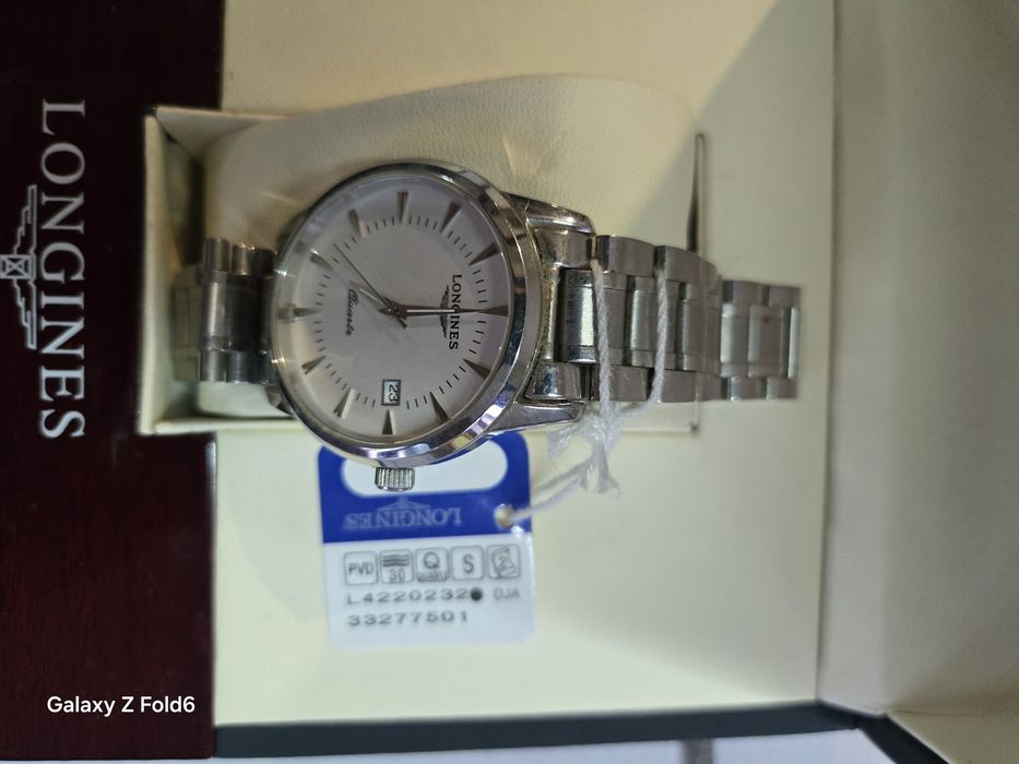 Longines quartz нов