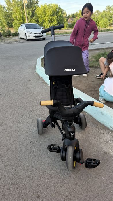 Doona трехколесный велосипед