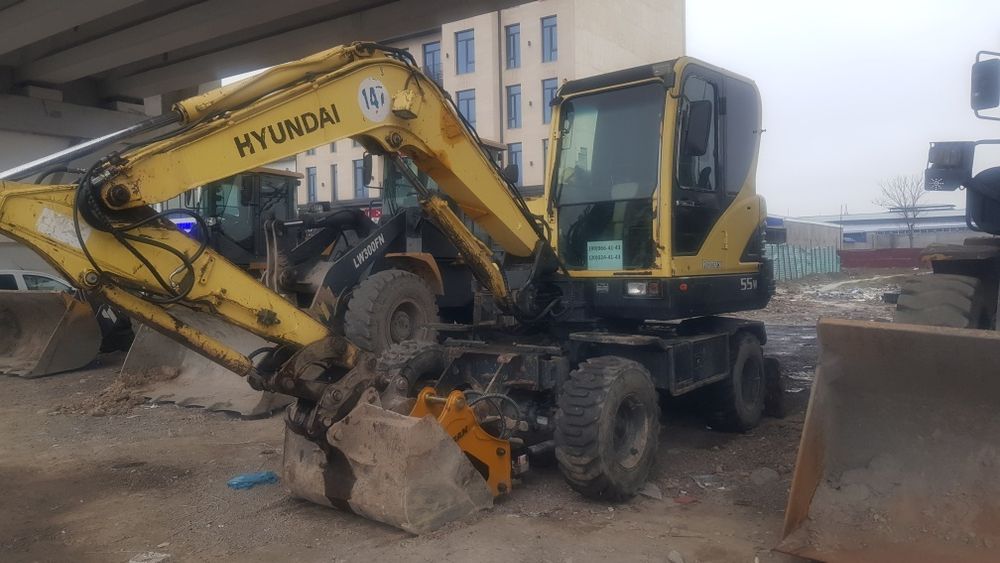 мини екискватор зизмати